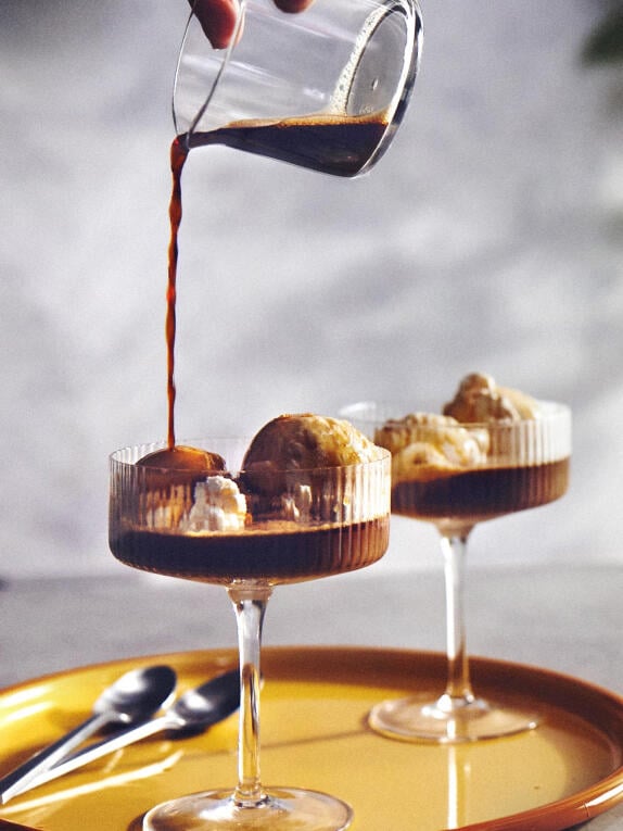 coffee concentrate poured over ice cream
